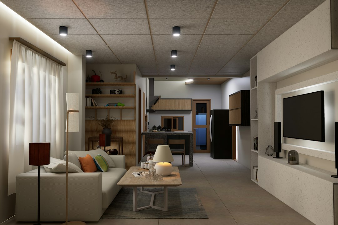 Cover for an interior design planning guide showing a simplified floor plan, layered lighting, and a coordinated materials palette